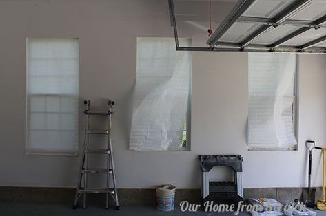 how to bug proof garage windows, garages, window treatments, windows, We started by removing our crappy paper shade Garage Windows, Linen Closet Storage, Garage Update, Window Inserts, Window Well, Concrete Lamp, Wood Blinds, Painted Chairs, Window Insulation