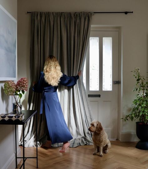 Making an entrance inviting with our beautiful linen curtains, this time in the home of artist and friend @megfarrellpaints. This Slade Stripe Inky Sky printed linen curtain effortlessly dresses Meg’s front door, keeping out the drafts and creating a relaxed, warm welcome. Curtain pictured here with a cottage header and oversized puddle drape for an informal scheme to suit any occasion. Curtain made to order by our expert makers. 🪡🧵 Get a quote for your own front door curtain through ou... Curtain Over Back Door, Curtains Over French Doors, Front Door Window Curtains, Curtains Doorway, Front Door Curtain, Front Door Curtains, Curtains Pictures, Linen Curtain, Front Doors With Windows