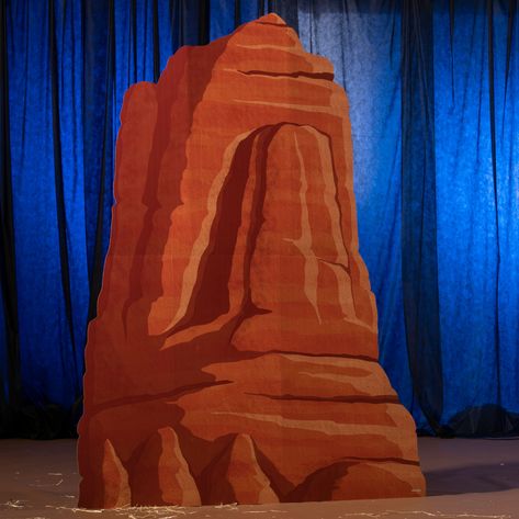 Set the scene for your Western themed party with a Cactus Ranch Left Rock Formation. This freestanding cardboard prop features an image of a red rock formation printed on one side. Use the Cactus Ranch Left Rock Formation alone, or with the Center and Right Rock Formations (sold separately). Made of cardboard Measures 9' 1" high x 6' 8" wide Printed on one side Easy assembly Large Party Props, Western Themed Party, Cardboard Props, Desert Theme, Tower City, Scene Setters, Vbs Themes, Western Theme Party, Rustic Romance