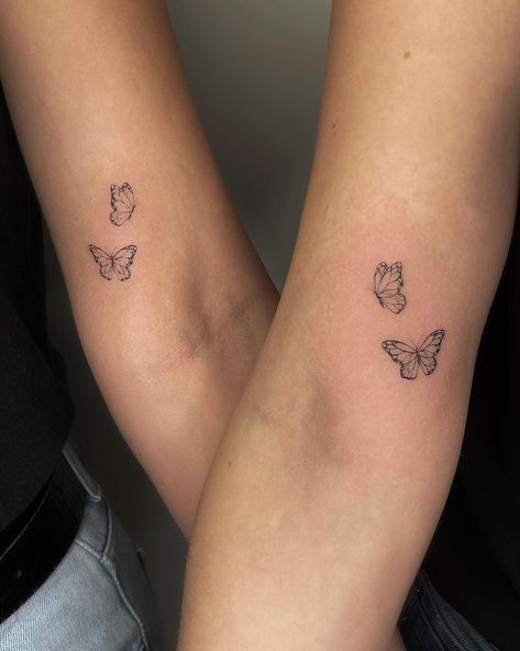 Minimalist Tattoo For Siblings, Sibling Tattoos For Two Sisters, Sibling Butterfly Tattoos, Small Butterfly Tattoo Matching, Butterfly Sibling Tattoo, Butterfly Tattoo For Sisters, Delicate Daisy Tattoo Simple, Butterfly Puzzle Tattoo, Butterfly Tattoo Sisters