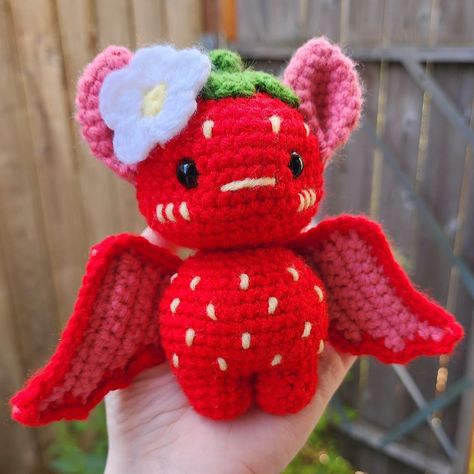 🦇🍓STRAWBERRY BAT🍓🦇 If you want to keep a bit of summer with you year-round, this friend's got you covered! I let the creative juices flow with this one, and I'm so happy with how it turned out! 🥹 🗒Pattern: Base pattern by @crochet.me.zaddy with modifications by me 🧶: @michaelsstores Loops & Threads Soft Classic and @joann_stores Big Twist Value . . . #crochet #handmade #crochetersofinstagram #crochetaddict #amigurumi #crochetlove #crocheting #yarn #instacrochet #handmadewithlove  #crocheti... Red Amigurumi, Crochet Worm, Crochet Stuffys, Bat Crochet, Crochet Bat, Fall Crochet, Crochet Strawberry, Big Twist, Crochet Inspo