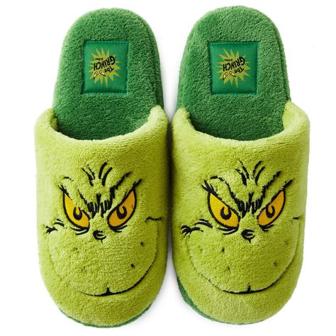 No need to stop Christmas from coming to your little corner of Whoville! Keep your toes toasty while you roam across your cave or kitchen with this cute set of Grinch sound slippers. With an embroidered design of the Grinch's grinning face, you'll surprise and delight a loved one who loves the Grinch with these slippers that sound off with one of four fun Grinchy phrases. The comfy, plush-lined footwear makes a fashionable gift for your favorite Dr. Seuss fan. | Dr. Seuss Grinch slippers feature William Core, Brrr Basket, Grinchmas Tree, Grinch Slippers, Brr Basket, Grinning Face, Grinch Movie, Grinch Stuff, Grinch Quotes