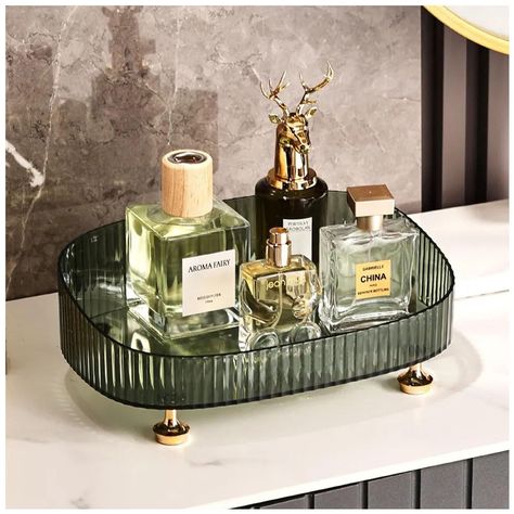 PRICES MAY VARY. 【Sturdy Material Perfume Tray】:Bathroom Vanity Tray is made of a oval design and molded into crystal clear acrylic, made well and simple look, easy to assemble and adhesion is strong. Bathroom counter tray can even be used with or without the feet and padding. Bathroom trays for counter has anti-slip gold feet with padding to help to keep away scratches. And makes small tray for bathroom firmly in place and doesn’t move around on a counter surface. Fragrance tray is easy to clea Bandeja Perfume, Perfume Organizer, Bathroom Vanity Tray, Bathroom Counter Decor, Makeup Tray, Organizer Bathroom, Bathroom Gifts, Dresser Tray, Perfume Organization