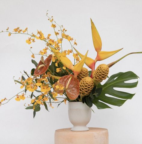 Tropical Leaves Arrangement, Tropical Boho Floral Arrangements, Hanging Heliconia Arrangement, African Flower Arrangements, Tropical Vase Arrangement, Modern Tropical Floral Arrangements, Bird Of Paradise Floral Arrangement, African Floral Arrangements, Hawaiian Floral Arrangements