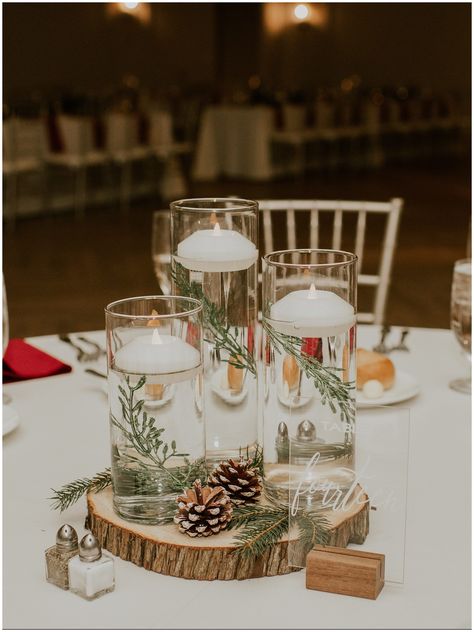 Add a touch of holiday magic to your winter wedding! Check out this Renault Winery Christmas Wedding for holiday and winter wedding ideas. With stunning tablescapes adorned with pine cones and garland, to festive candlelit table centerpieces. Create a winter wonderland celebration that will leave your guests in awe and inspired!  Photography by Sydney Madison Creative Christmas Rustic Wedding Ideas, Winter Wedding Souvenirs, Christmas Themed Wedding Table Decor, Winter Wreath Centerpiece Wedding, Winter Wedding Fairy Lights, Winter Wedding Cocktail Hour Decor, Easy Christmas Wedding Centerpieces, December Wedding Decor Ideas, Pine Winter Wedding Centerpieces