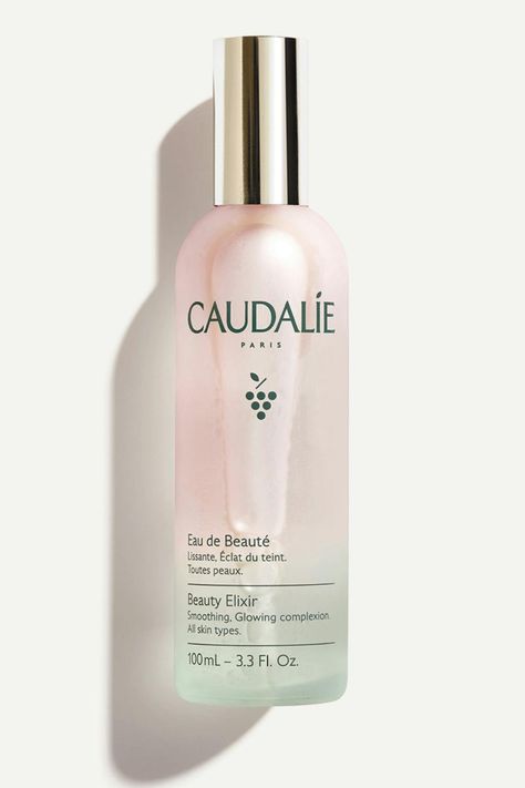 "Discover CAUDALIE Beauty Elixir! ✨ This vegan face mist enhances complexion glow and doubles as a makeup setting spray. Formulated with green grape and orange blossom water, plus essential oils like peppermint, rose, lemon balm, and rosemary, it hydrates and boosts radiance naturally. Elevate your skincare routine with CAUDALIE for dewy, refreshed skin!" Peppermint Rose, Caudalie Beauty Elixir, Green Grape, Orange Blossom Water, Beauty Elixir, Makeup Setting Spray, Facial Spray, Skin Prep, Green Grapes