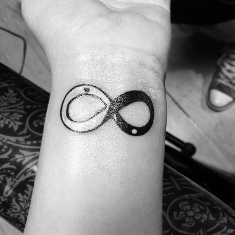 Yin and Yang infinity wrist tattoo Infinity Wrist Tattoo, Mrs Tattoo, Best Wrist Tattoos, Infinity Tattoo On Wrist, Grey Ink Tattoos, Symbols Of Strength Tattoos, Japanese Tattoo Symbols, Cool Wrist Tattoos, Tattoo Wrist