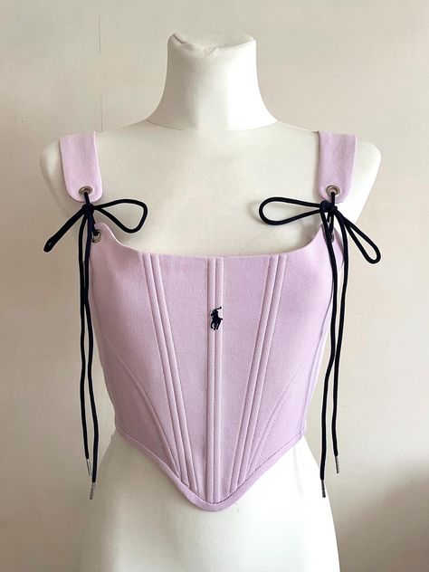 Pink corset top Upcycling Reworked corset ♻️ The corset is made from a polo t shirt ▪️The straps tie at the front with dark blue laces ▪️ the corset has a cotton lining ▪️ stainless steel eyelets ▪️plastic bones  ✅SIZE  size S-M fits bust circumference 85 - 93 cm  (33,4 -36,6 inch) Corset Top Diy, T Shirt Corset, Reworked Corset, Shirt Corset, How To Make A Corset, Korsett Top, Pink Corset Top, Diy Corset, Reworked Clothes