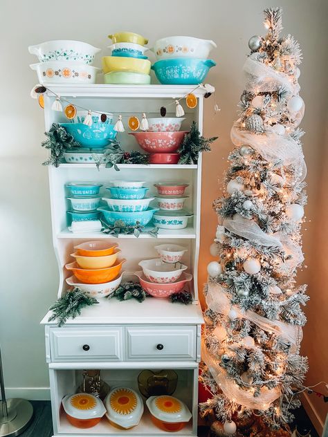 Pink Pyrex, blue Pyrex, vintage Pyrex, small white hutch with a Christmas tree Vintage Pyrex Display, White Hutch, Pyrex Display, Everyday Moments, Vintage Pyrex, Orange And Yellow, Pyrex Vintage, Simple Pleasures, Hutch