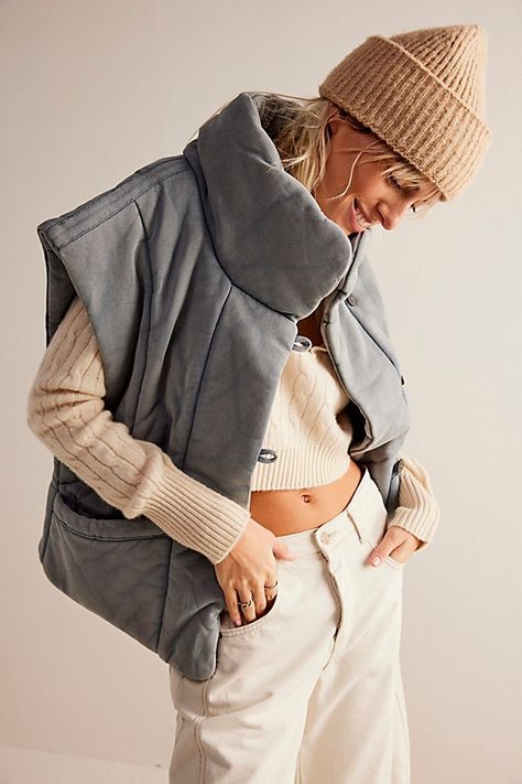 An effortless essential, this so cool puffer vest is featured in an oversized, quilted design with exaggerated collar detail and defined shoulders for shape. * Button-front closure * Side pockets * Defined seaming | Roll With Us Puffer Vest Jacket by Free People in Silver, Size: S Puffer Vest Jacket, Exaggerated Collar, Oversized Vest, Puffer Vest, Boho Clothing, Quilting Designs, Boho Outfits, Vest Jacket, Puffer