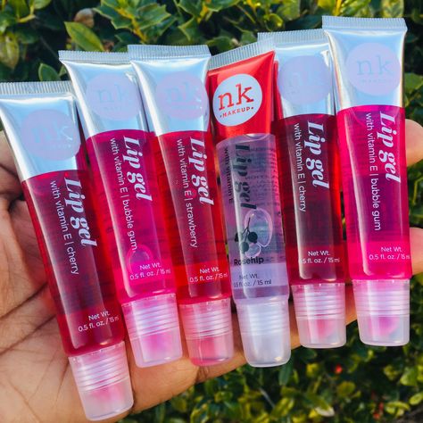 NK Lip Gloss now available. #lipgloss #lipglossfordarkskin #lipglossaddict #glossierlipgloss #glossylips #glitterlips #flavoredlipgloss #lipglosspoppin #pinklips #redlips #lipstick #lipbalm Nk Lip Gloss, Broadway Lip Gloss, Glossy Lips Makeup, Natural Lip Gloss, Lip Gloss Cosmetics, Lip Gloss Balm, Lip Balm Collection, Best Lip Gloss, Diy Lip Gloss