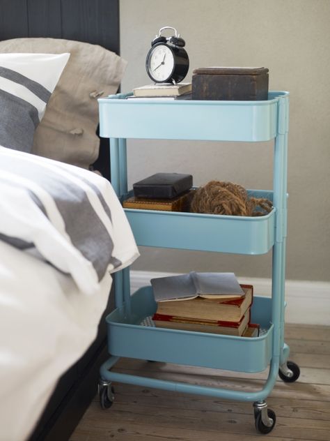 The three-tiered RÅSKOG kitchen cart works as well beside your bed as it does beneath your countertop! Its bins help keep your clock, eyeglasses, and favorite books handy, and  casters let you roll it wherever you need it. Raskog Ikea, Ikea Raskog Cart, Raskog Cart, Ikea Cart, Ikea Raskog, Ikea Finds, Apartment Storage, Utility Cart, Ikea Furniture