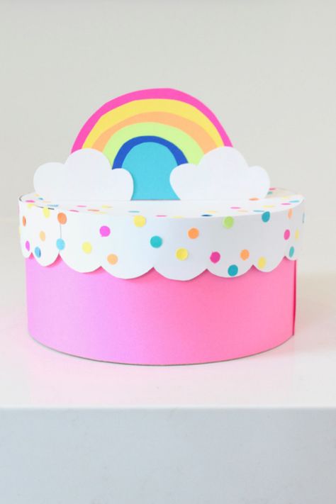 When it comes to fun and useful crafts, this colorful storage box puts the icing on the cake. 🎂 To create the rainbow, draw one small arch (the last layer of the rainbow) with a pencil on the bottom of Astrobrights Cardstock Paper, and then cut five additional arches, each other larger in size than the one before it. View the rest of the instructions at the link. *Difficulty Level: Medium* Cake Of Paper Birthday, Birthday Cake Paper Craft, Carton Cake Ideas, Paper Cake Diy, Cake Paper Craft, Paper Birthday Cake, Easy Paper Airplane, Make Paper Plane, Kids Party Centerpieces