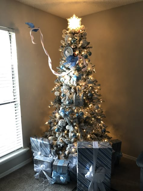 My 2018 Christmas tree  Disney’s Cinderella theme  Blue, white, silver Christmas tree Cinderella Christmas  #themedchristmastree #christmastree Pink Blue White Christmas Tree, Disney Castle Christmas Tree, Cinderella Themed Christmas Tree, Cinderella Christmas Tree Ideas, Cinderella Christmas Decorations, Fairytale Christmas Tree, Cinderella Christmas Tree, Disney Christmas Tree Theme, White Silver Christmas Tree