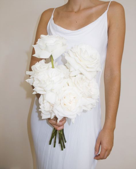 Dreamy bridal bouquet with reflexed white roses Large White Rose Bridal Bouquet, White Bridal Bouquet With Orchids, Reflexed Roses Wedding, Celebrity Wedding Bouquets, All White Roses Wedding, Gardenia Bouquet Wedding, Reflexed Rose Bouquet, Gardenia Wedding Bouquet, White Bouquet Roses