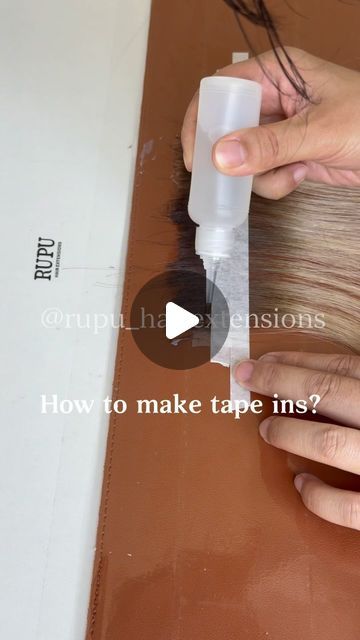 Hair Factory | Vlight | Genius Weft | Invisible Tapes on Instagram: "How to make tape ins? . . . #tapeinextensions #tapehairextensions #tapeextensions #hairtutorials #hairtutorialvideo #lasvegashairstylist #maneaddicts #redkinshadeseq #thebtcteam #saloncentric #salonbusiness #foilyage #brunettebalayage #brunettehair #showmethebalayage #hairreels #haireducation" How To Reuse Tape In Hair Extensions, How To Make Tape In Hair Extensions, Hair Styles With Tape In Hair Extensions, Invisible Tape In Hair Extensions, Tape Ins On Short Hair, Tape In Extensions Placement Guide, Tape In Hair Extensions Placement, Diy Tape In Hair Extensions, Hair Extension Tips And Tricks