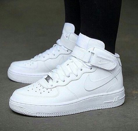 All white uptowns. Forever classic. Sepatu Air Jordan, Outfits With Air Force Ones, Обувь Air Jordan, Boty Nike, Nike Air Force 1 Mid, Nike Shoes Air Force, White Nike Shoes, Jordan Shoes Girls, Custom Nike Shoes