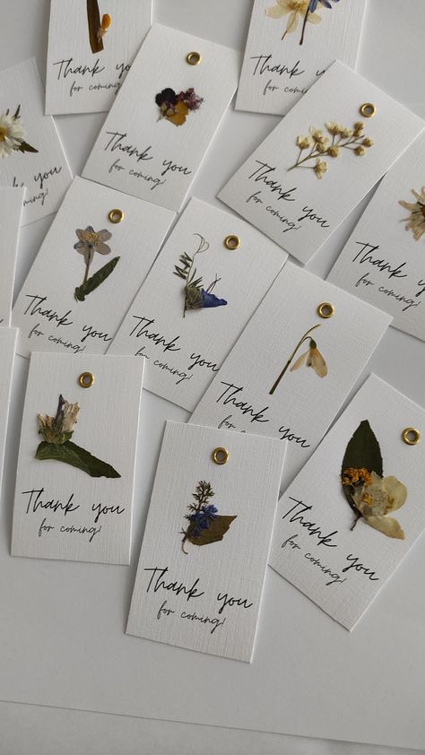 Each thank you card has its own meadow flower, real pressed flower carefully glued on. Perfect for nature inspired wedding, dried flowers wedding, Rustic weddings or also for birthday party, anniversary party, for a bachelorette party. I use white, matte, decorative paper, 250 gsm. Flat card has a hole surrounded by a gold-colored metal ring. This will ensure that the card with the ribbon does not tear. The ribbon is not included so you can match the colors to your event. Meadow flowers go together with all colors. I can make cards with any text. The size of a card is 10 X 6 cm, 3.9 X 2.3 inches  If you have any special requirements please write to me.  The flowers may differ from the pictures, it depends on the season and the harvest. Pressed Flowers Cards, Pressed Flower Wedding Invitations, Dried Flower Cards, Pressed Flower Wedding, Pressed Flower Cards, Wedding Dried Flowers, Pressed Flowers Diy, Dried Flowers Wedding, Pressed Flower Crafts