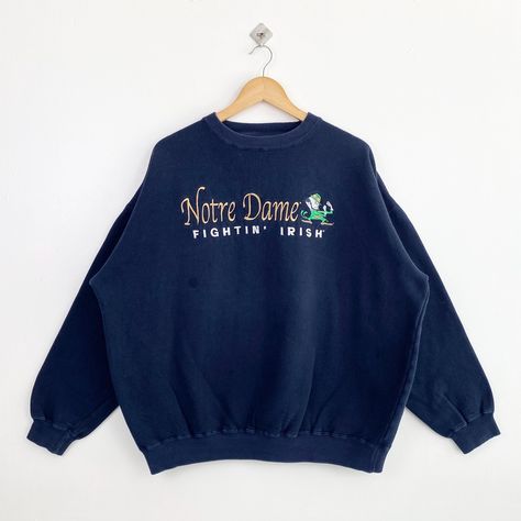 Vintage NCAA University of Notre Dame ‘Fighting Irish’ Crewneck Sweatshirt Embroidery Logo Blue Color Men’s XXL by OzzyVintageShop on Etsy Irish Sweatshirt, Vintage College Sweatshirts, University Of Notre Dame, Sweatshirt Embroidery, Notre Dame University, College Sweatshirt, Embroidery Sweatshirt, Fedex Express, Dhl Express