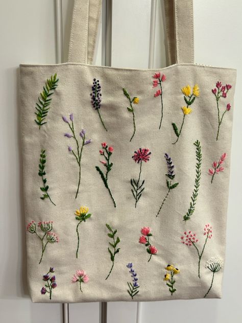 Floral embroidery, lined canvas tote with pockets and pleated bottom, wildflower pattern Tote With Pockets, Brilliant Quotes, Flower Stitch, Wildflower Pattern, Desain Tote Bag, Purse Collection, Embroidery Crafts, Tote Bag With Pockets, Embroidery Lessons