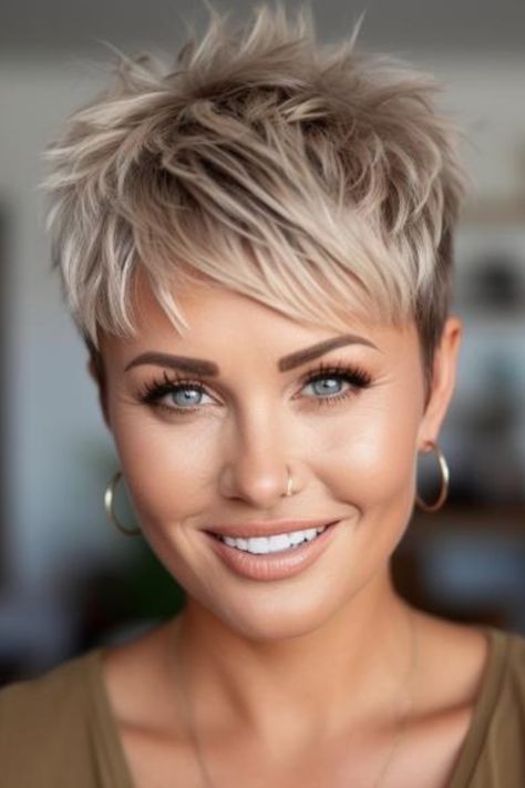 This is a fun and edgy hairstyle that the casual pixie with spiky bangs. These spiky bangs update the classic pixie cut, making it youthful and modern. Click here to check out more flattering hairstyles for women over 50 with bangs. Short Hair For Coarse Hair, Pixie Wigs For White Women, Texturized Pixie Haircut, Crop Haircut Short Women, Piecey Pixie Haircut, Short Hair For Plus Size Women Over 40, Short Spiky Haircuts For Women Over 50, Short Sassy Hair Older Women, Short Edgy Pixie Cuts Shaved Sides