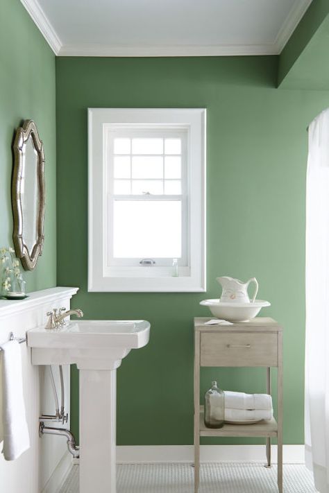 When in doubt, go with a fresh shade of green. "At the moment, I'm really drawn to fresh botanical shades, like 'Magnolia Green,'" Joanna said. "I've always been drawn to nature in my design work and really love bringing a touch of it inside. I think it would be fun choice for kitchen cabinets, or anywhere that needs a touch of nature." The hue is also perfect for brightening up a bathroom, entryway, guest room, or any other small space. Joanna Gaines Favorite Paint Colors, Green Bathroom Paint, Joanna Gaines Bathroom, Fixer Upper Paint Colors, Joanna Gaines Paint, Bathroom Paint, Palette Design, Bathroom Paint Colors, Favorite Paint Colors