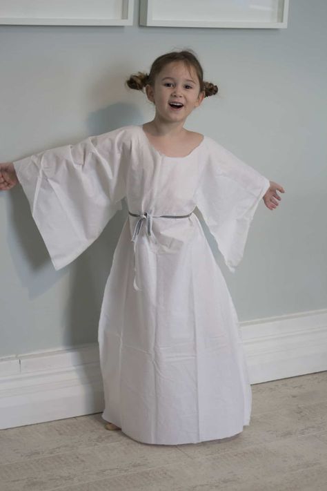 My girls love dressing up for World Book Day. They love reading and have lots of characters that they love and want to dress up as. This year Little Miss J is still really into Star Wars. Last year she went dressed up as Darth Vader and this year she wanted to be Princess Leia. I made her a really easy costume out of Simple Angel Costume, Diy Princess Leia Costume, Kids Angel Costume, Princess Leia Costume Diy, Princess Leia Dress, Angel Costume Diy, Mary Costume, Princess Leia Costume, Biblical Costumes