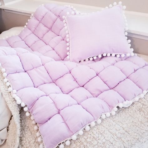 "Handmade Item Ships from La Mirada, CA A beautiful soft pastel lilac/lavender organic muslin double gauze bubble quilt set. This quilt measures approx. 36\"x 47: (perfect crib size) along with a matching decorative pillow measuring 15\"x 15\". Top layer of this quilt is 100% cotton natural muslin (double guaze) a beautiful pastel lilac/lavender color. Middle layer: Soft white cozy flannel. Bottom layer: An absolutely beautiful 100% cotton embroidery fabric (lots of detail). Each 6 inch (70 pill Pink Nursery Bedding, Lavender Quilt, Modern Nursery Room, Nursery Themes Neutral, Boho Chic Nursery, Quilt Baby Blanket, Bubble Quilt, Baby Crib Quilt, Puff Quilt