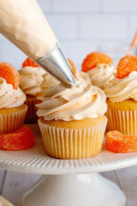 Southern Plate created these Orange Dreamsicle Cupcakes as a sweet trip down memory lane! These light and fluffy cupcakes are bursting with bright orange flavor and topped with smooth, creamy vanilla frosting - a classic creamsicle in cupcake form! Orange Dreamsicle Cupcakes, Dreamsicle Cupcakes, Orange Creamsicle Cupcakes, Creamy Vanilla Frosting, Creamsicle Cake, Delicious Cupcakes Recipes, Fluffy Cupcakes, Plate Recipes, Lime Cupcakes