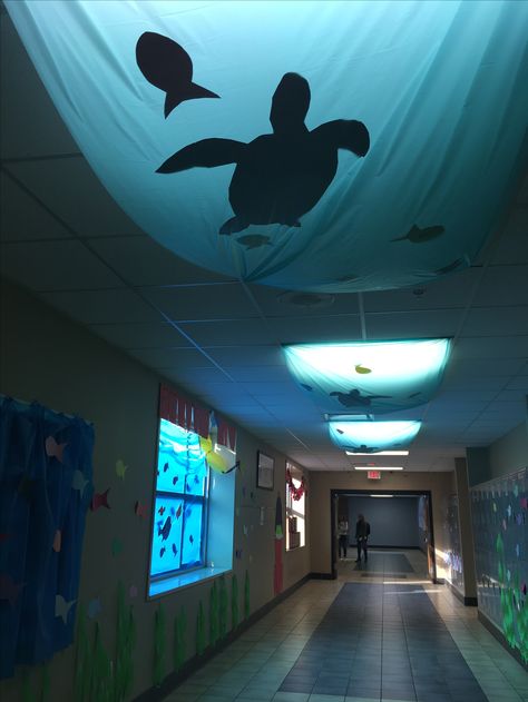 Finding Nemo Homecoming Hall Decorating Finding Nemo Office Decor, Nemo Hallway Decorations, Halloween Classroom Hallway Decorations, Hallway Decorating Spirit Week, Finding Nemo Photo Booth, Hoco Hallway Ideas, Diy Finding Nemo Party Decorations, Finding Nemo Halloween Decorations, Ocean Hallway Decor School