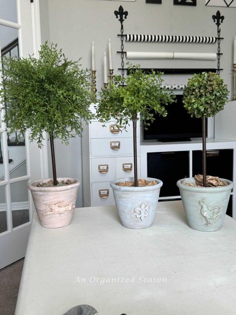 Would you love to have plants in your home but don't want the hassle of watering and pruning? A faux topiary is the perfect solution! Indoor Topiary, Topiary Decor, Faux Topiary, Topiary Diy, Green Spray Paint, Boxwood Topiary, Topiary Trees, Floral Tape, Pretty Plants