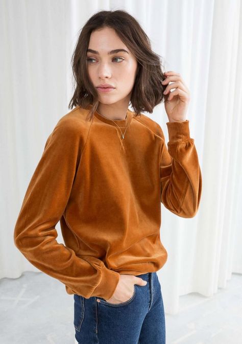 & Other Stories, Velour Sweatshirt - You can always say yes to spontaneous entertaining when you have a sweatshirt that looks both ritzy and relaxed.   Style Hint: Throw this on with jeans when last minute invites pop up in the inbox. Have more time? Wear it with a metallic pleated skirt and velvet sandals to match. #velours #shopping #velvet #ootd #winter #sweatshirt #sweater #style Indigo Design, Metallic Pleated Skirt, Velvet Sandals, Velvet Sweatshirt, Straight Clothes, Velour Tops, Velvet Clothes, Women's Sweatshirts, Sweatshirt Outfit