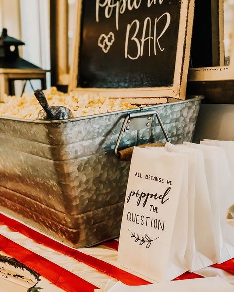 All because he popped the question All Because He Popped The Question, Movie Night Engagement Party, Popcorn Bar Wedding Receptions, Wedding Reception Popcorn Bar, Snack Mix Bar, Wedding Late Night Snacks, Wedding Snack Bar, Wedding Popcorn Bar, Popcorn Station