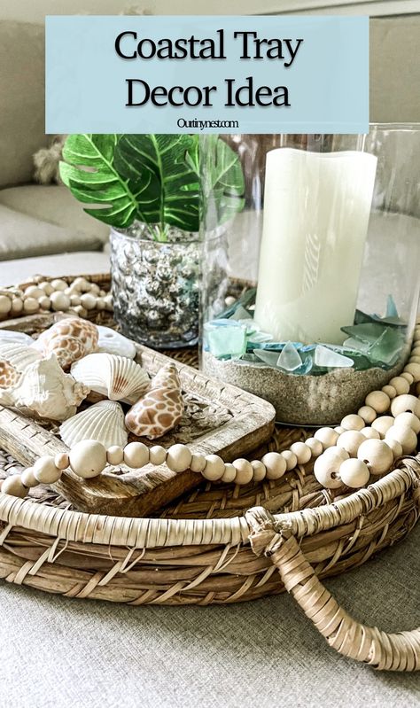 Summer vignette or tray decor idea for coastal beach decor Coastal Kitchen Island Decor, Coffee Table Coastal Decor, Coastal Tray Decor Ideas, Summer Tray Decor Ideas, Coastal Coffee Table Decor Ideas, Neutral Beach Decor, Coastal Table Centerpiece, Dark Coastal Decor, Beach Table Centerpieces