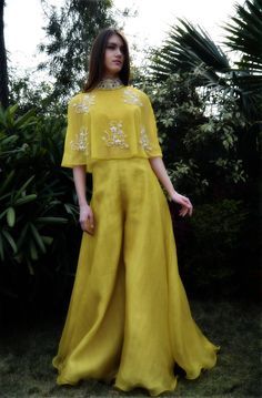 Yashodhara crop top paired with flaired palazzos Haldi Outfits, Salwar Kamiz, Indian Dresses Traditional, Trendy Dress Outfits, Designer Dresses Casual, Indian Bridal Outfits, Designer Party Wear Dresses, Stylish Party Dresses, Party Wear Indian Dresses