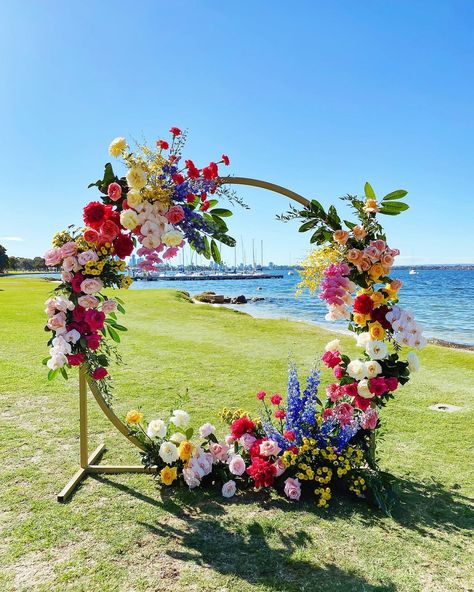 Ａｎｎａｌｉｅｓｅ Ｍａｆｆｅｓｃｉｏｎｉ on Instagram: “Love a circle backdrop when the natural backdrop is a winner! For Phebe + Sheamus @nedlandsyachtclub Celebrant extraordinaire…” Bridal Shower Chocolate, Wedding Decorations Diy Centerpiece, Pastel Wedding Theme, Circle Backdrop, Flower Backdrop Wedding, Floral Arch Wedding, Arch Decoration, Wedding Arch Flowers, Wedding Ceremony Backdrop