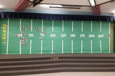 Stephanie Beach, a teacher in California, shares, "Our school holds several schoolwide competitions throughout the year to motivate students to stay focused and pass their #iReady lessons. For the month of October, we are holding an i-Ready competition. Each class has a football on a large football field board. The class football moves ahead for every lesson passed in reading. Our Intervention teacher updates the board twice a week. Iready Math Competition, Class Competition Bulletin Board, Iready Reading Bulletin Board, Wildly Important Goals Scoreboard Ideas, Iready Tracker Bulletin Board, Iready Lessons Passed Bulletin Board, Iready Goal Bulletin Board, School Competition Ideas, Iready Data Tracking Bulletin Board