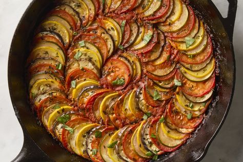 And it’s actually way easier to make than it looks. How To Make Ratatouille, Ratatouille Recipe, French Recipe, Cherry Tomato Pasta, Salmon Potato, Lunch Appetizers, Rice Ingredients, Food History, Summer Vegetable