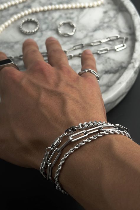 3mm Twisted Rope Bracelet for Men in shimmering silver. A streetwear wristlet that combines vintage ornament aesthetics with contemporary street style. A perfect silver accessory for him, epitomizing streetstyle jewelry. Men’s Bracelets Silver, Silver Bracelet Mens, Men Wearing Jewelry Aesthetic, Silver Accessories Men, Mens Metal Bracelet, Men's Bracelets Silver, Cool Men Jewelry, Men Jewelry Silver, Mens Jewelry Aesthetic Silver