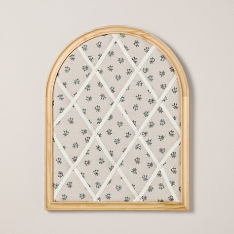 Create an amazing display of your family photos and other memories with the Arched Photo and Memory Collage Board with Patterned Fabric from Hearth & Hand™ with Magnolia. This arched board features floral-print fabric with tufted accents to elevate the look. The wooden frame creates an appealing look, while the elastics make it convenient to display. Place it on the tabletop or hang over the wall for a beautiful look. Hearth & Hand™ with Magnolia: Gather • Create • Enjoy Ribbon Picture Board, Fabric Photo Frames, Fabric Photo Board, Wall Art Above Desk, Family Keepsake Crafts, Apartment Wall Decor Bedroom, Grand Millennial Style Decor, College Room Decor Ideas Wall Art, Photo Wall Ideas Bedroom Aesthetic