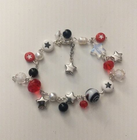 star red black and white beaded bracelet Red Aesthetic Bracelet, Black White Beaded Bracelet, Vintage Beaded Bracelets, Black And Red Beaded Bracelets, Star Bracelet Bead, Red Charm Bracelet, Star Beads Bracelet, Red Beaded Jewelry, Red Beads Bracelet