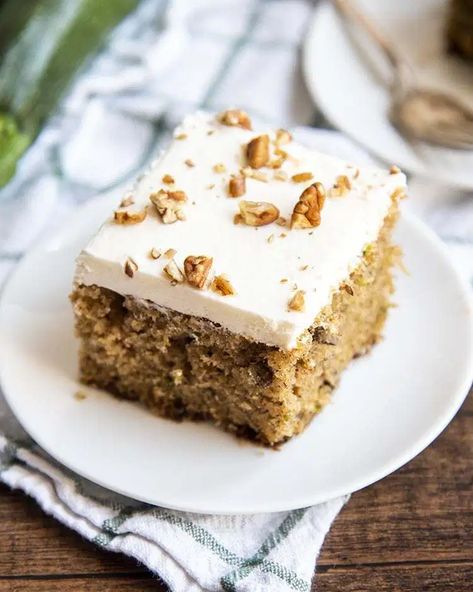 This zucchini cake is moist, delicious, and perfectly spiced. It's topped with a yummy cream cheese frosting. It will be your new favorite way to eat your vegetables. Preachers Cake, Preacher Cake, Hummingbird Cake Recipes, Carrot Cake Bars, Southern Cake, The Seasoned Mom, Sweet Breakfast Treats, Hummingbird Cake, Best Carrot Cake