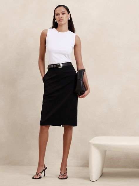 Indulgent and elegant, this expertly tailored pencil skirt elevates any wardrobe with a luxurious wool fabrication and a darted waist to accentuate in stunning proportions.  PENCIL SKIRT FIT: High rise, fitted from hip to hem.  RESPONSIBLE WOOL STANDARD CERTIFIED (Control Union Certifications CU 862581): This global standard protects the sheep that supply the wool for this sweater as well as the land they graze, working to make it better for the environment and the sheep.  Certified by NSF Certi Zipper Skirt Outfit, Office Outfits Women Skirt, Banker Outfits, Black Pencil Skirt Outfit, Chic Business Attire, Business Casual Skirt, White Skirt Outfits, Pencil Skirt Fashion, Work Skirt