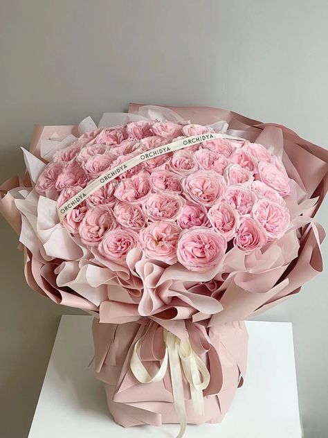 Dear gentle flower lovers, this is Charlotte - a splendid bouquet of pink fragrant peony roses destined to captivate and charm. Handcrafted with love by our Orchidya florists, this bouquet radiates elegance and joy, making it the perfect gift for any occasion or a delightful way to brighten someone's day. The flower bouquet will be wrapped in a complimentary wrapping and a bouquet bag with water. To include a vase with your bouquet, kindly select one from our Vase Collection. We kindly request t Prettiest Bouquet Of Flowers, 30 Roses Bouquet, Flower Bouquet Unique, Luxury Bouquet Of Flowers, Pink Peonies Aesthetic, Birthday Roses Bouquet, Big Flower Bouquet, Aesthetic Flower Bouquet, Bucket Flowers