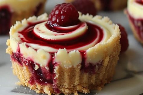 Berry Swirl Cheesecake Bites - recipestasteful Berry Bites, Vanilla Wafer Crust, Air Fryer Recipes Dessert, Cheesecake Bites Recipe, Vanilla Wafer, Chocolate Poke Cake, Swirl Cheesecake, Lemon Cookies Recipes, Blueberry Coffee Cake