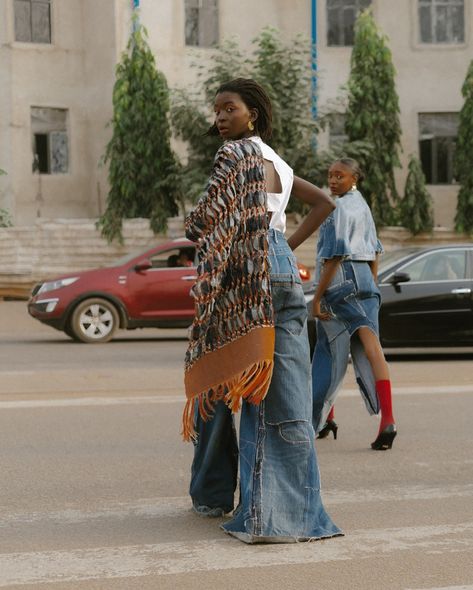 “Taking It To The Streets” with a selection of their best-selling pieces for their latest campaign, Nkwo Official ( @nkwo_official ) epitomizes their dedication to sustainable fashion and the celebration of African craftsmanship. Each garment intricately blends traditional textiles with contemporary aesthetics, meticulously handcrafted in Nigeria using locally sourced materials. With bold prints, exquisite detailing, and visionary silhouettes, their collections embody a profound commitment t... Armor Skirt, Modern African Fashion, Africa Chic, Upcycled Products, Reconstructed Clothing, Unique Fashion Outfits, Traditional Textiles, Abuja Nigeria, Upcycled Denim Jacket