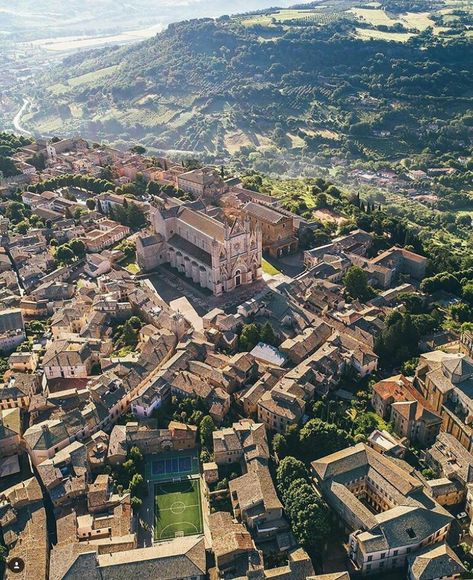 Churches and a tennis court in Orvieto Orvieto Italy, Italy Football, Day Trips From Rome, European Village, Best Of Italy, Explore Italy, Europe Photos, Italy Trip, Italy Photography