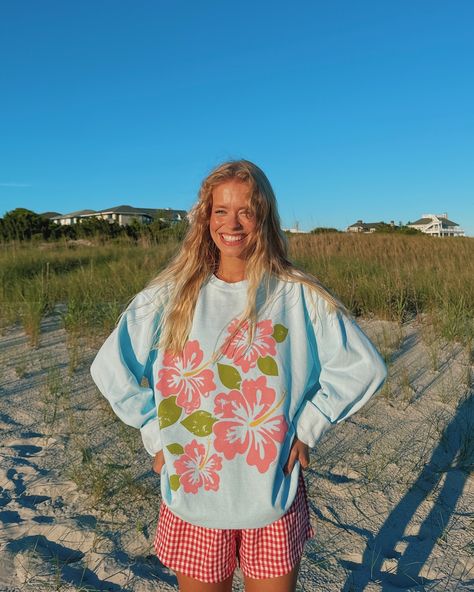 There is nothing better than getting cozy in a crew for sunset after a yummy beach dinner and a long day in the sun🌞👙🌴🫶🏻 Baby blue, sweetie hand drawn hibiscus flowers with a distressed look for a lived in feel, and so cozy!!! I’m wearing a size large in these pics for reference! Launching next Friday, May 31st at 10 am est with the rest of our new summer designs!!!🌊💞 Watching The Sunrise, Beach Dinner, Outfit Oversize, Summer Designs, Next Friday, Beachy Style, Hawaiian Shirt Women, Coastal Granddaughter, Trendy Beach