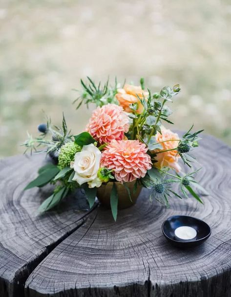 With their intricate texture and range of sizes, dahlias are a gorgeous choice to add a statement to any wedding bouquet or wedding centerpiece. We love the pop of coral dahlias in the center of this arrangement for a rustic summer wedding. Find more summer wedding flowers you'll love at the link. // Photo: James x Schulze and Florals: Bare Root Flora June Flowers In Season, September Flowers In Season, Dahlia Centerpiece Wedding, Wedding Dahlias, June Wedding Flowers, Flowers In Season, Wedding Fireplace, August Flowers, Mums Wedding