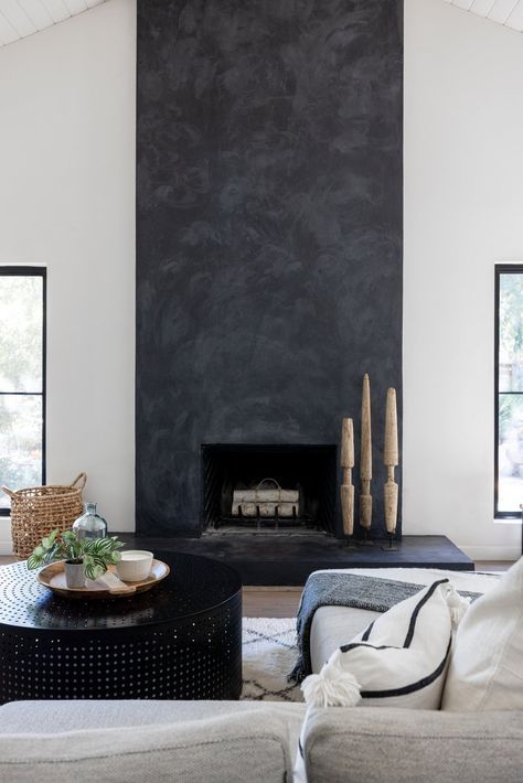 Tile Fireplace Black, Black Concrete Fireplace Surround, Limewash Black Fireplace, Dark Gray Fireplace Wall, Dark Stucco Fireplace, Black Painted Fireplace Wall, Grey Plaster Fireplace, Dark Concrete Fireplace, Black Metal Fireplace Surround